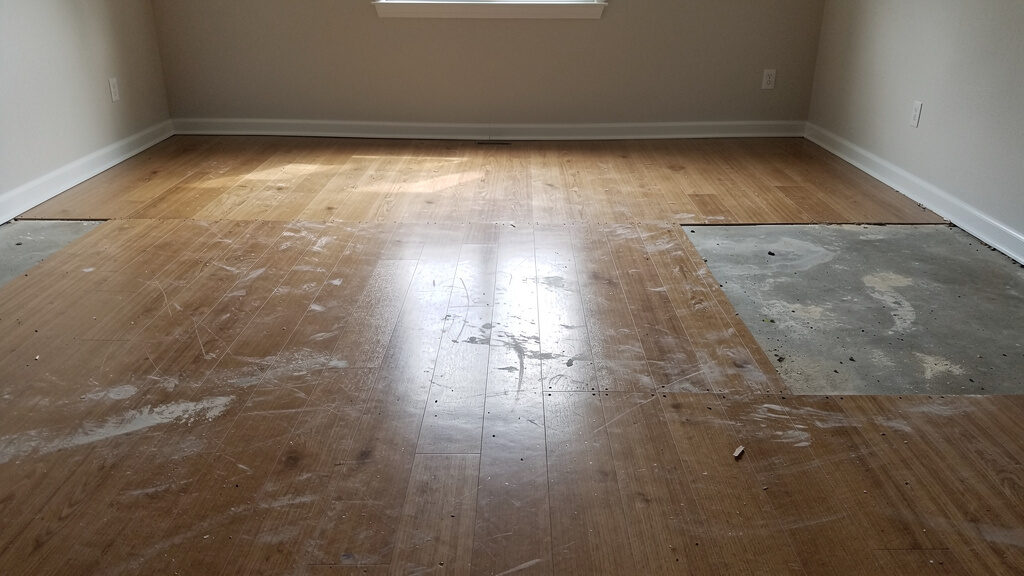 Large volume of carpet and padding material staged for removal