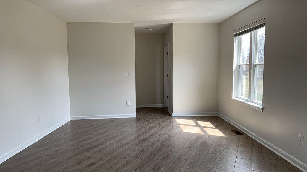 Cleanout crew clearing apartment complex unit efficiently