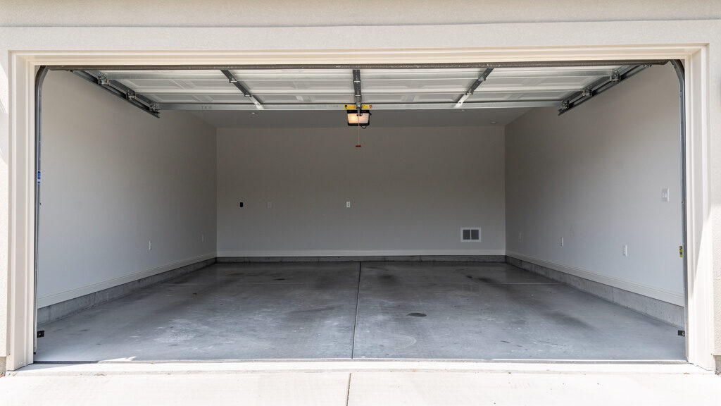 Organized piles showing separation of salvageable and disposable garage items