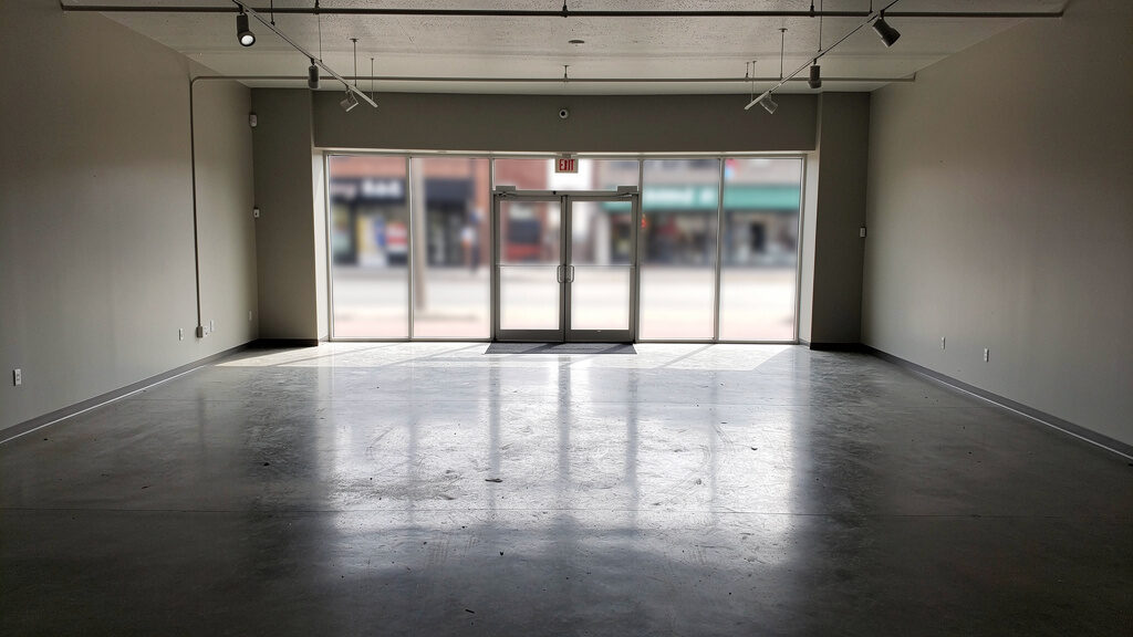 Professional junk removal team clearing retail display items